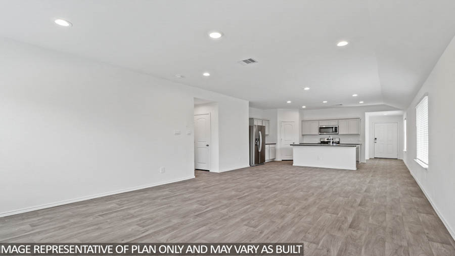 Open concept living, dining, and kitchen area