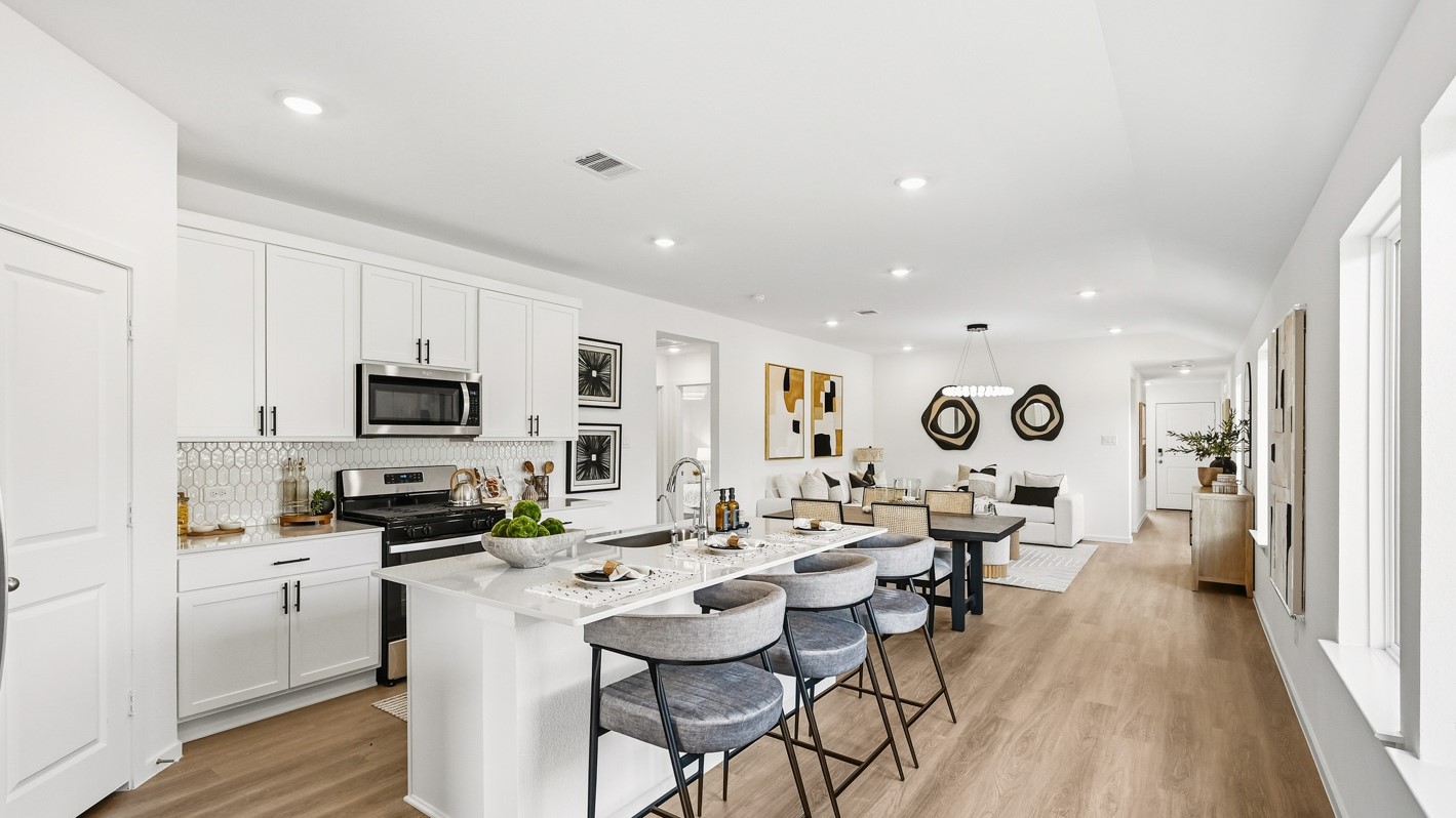 Open concept living, dining, and kitchen area