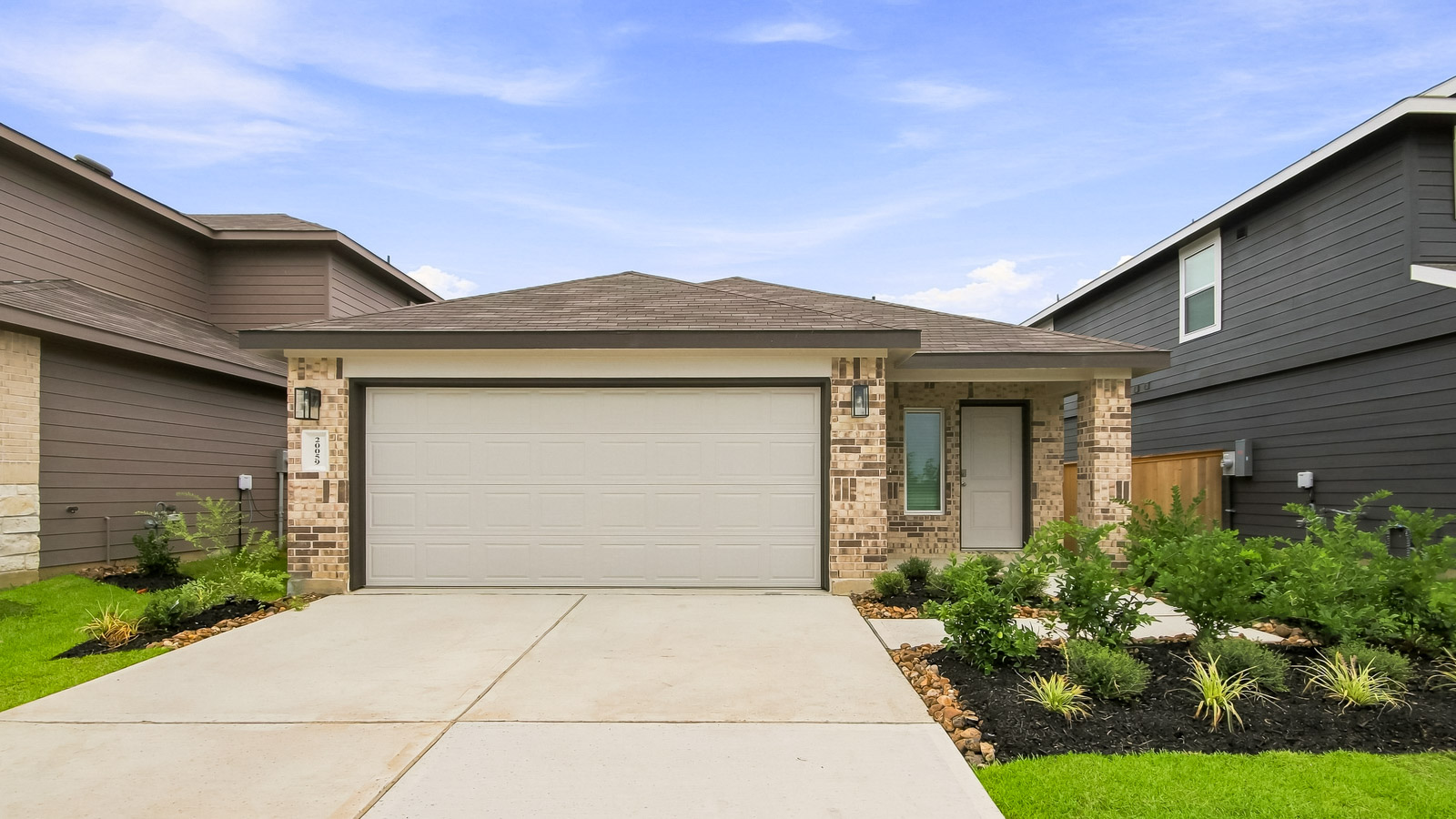 single story home with 2 car garage