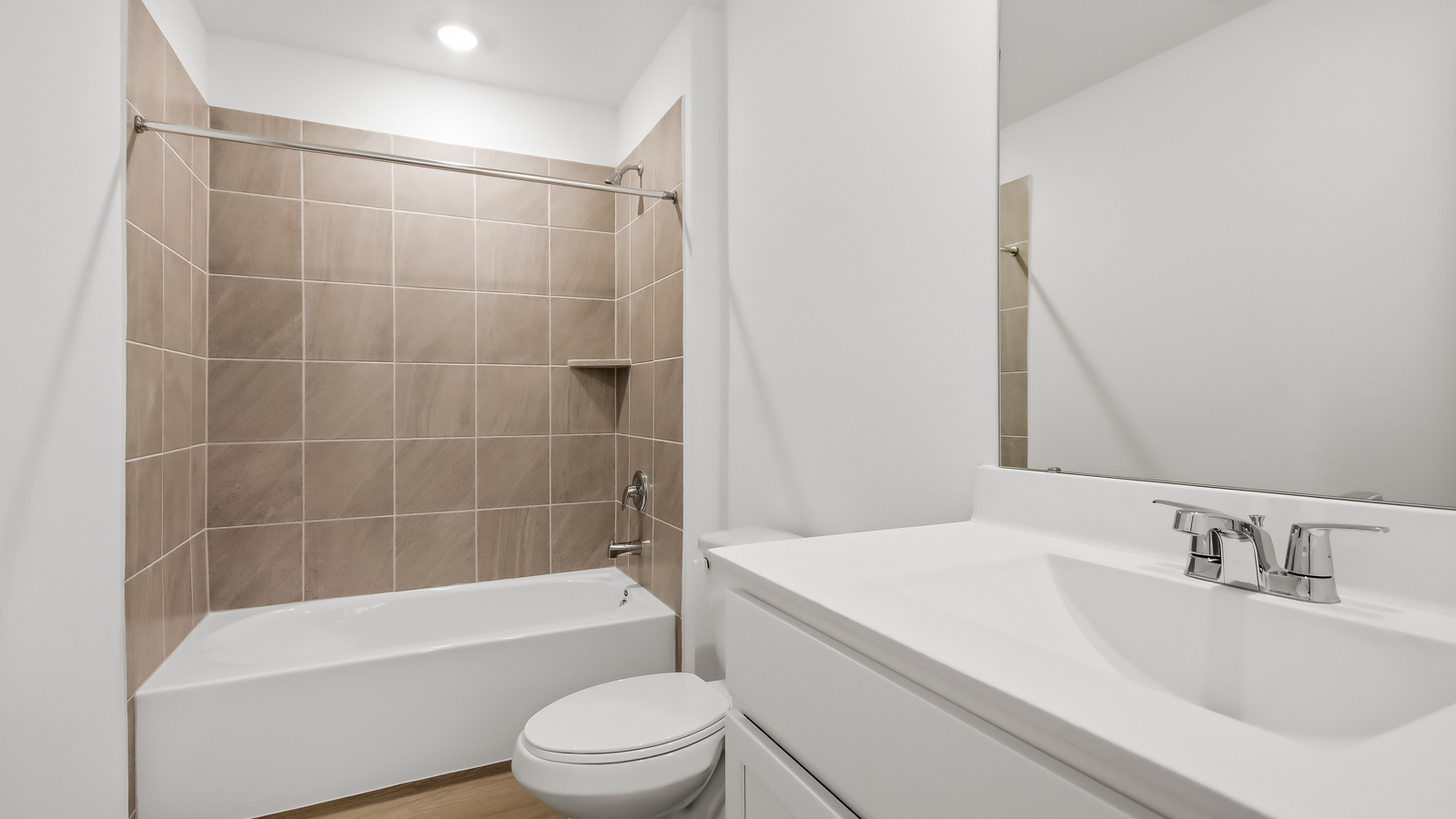 secondary bathroom with tub/shower combo