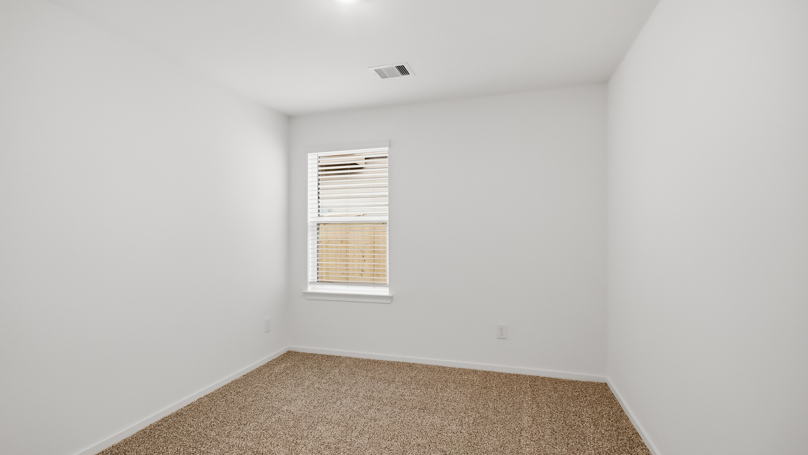 secondary bedroom with bright window