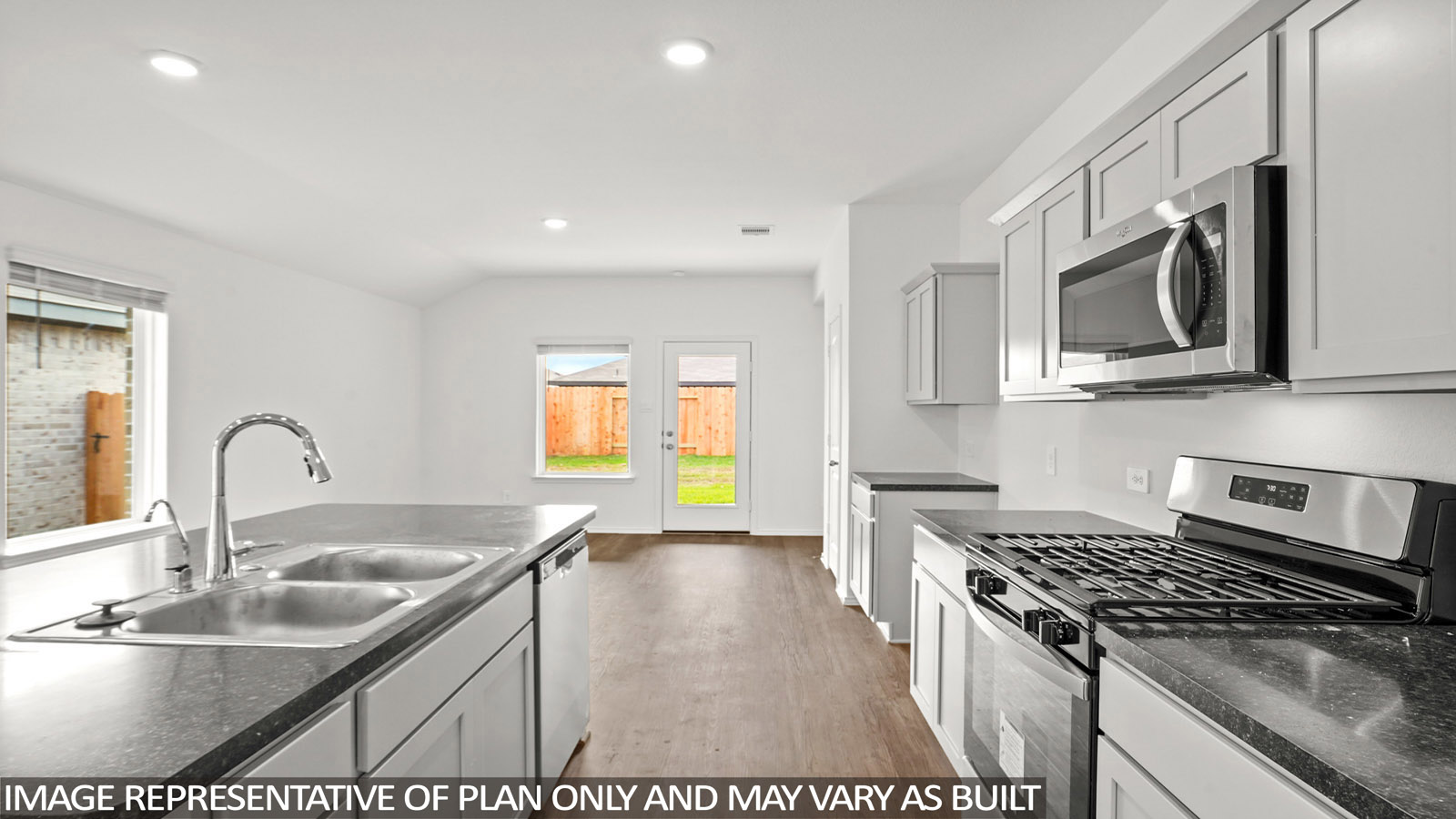 Open concept living, dining, and kitchen area
