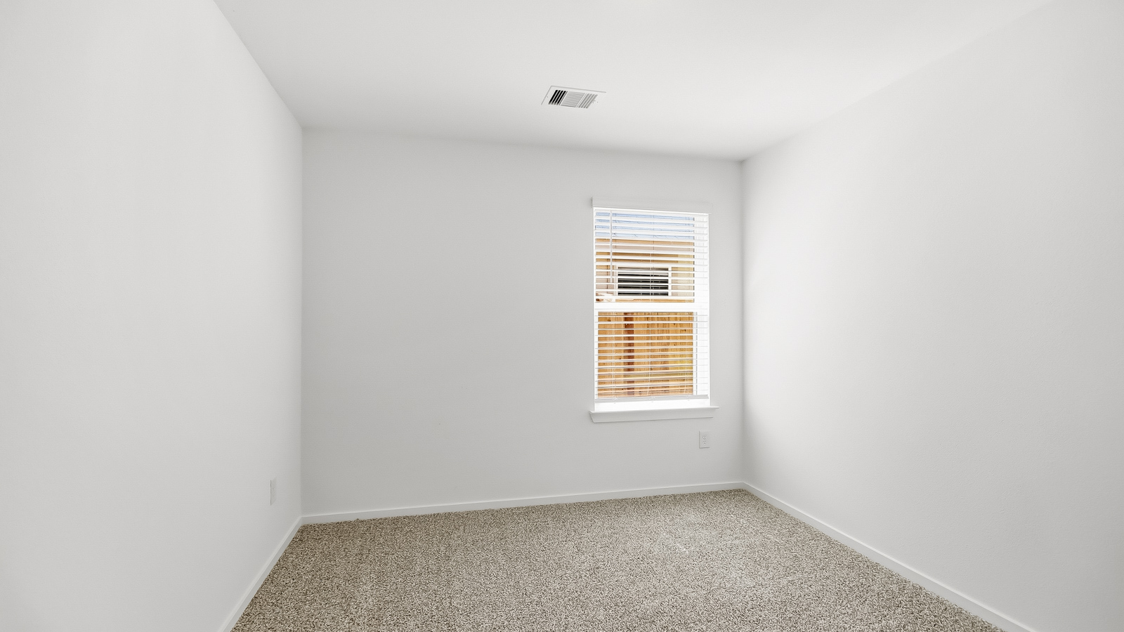 Secondary bedroom with bright window