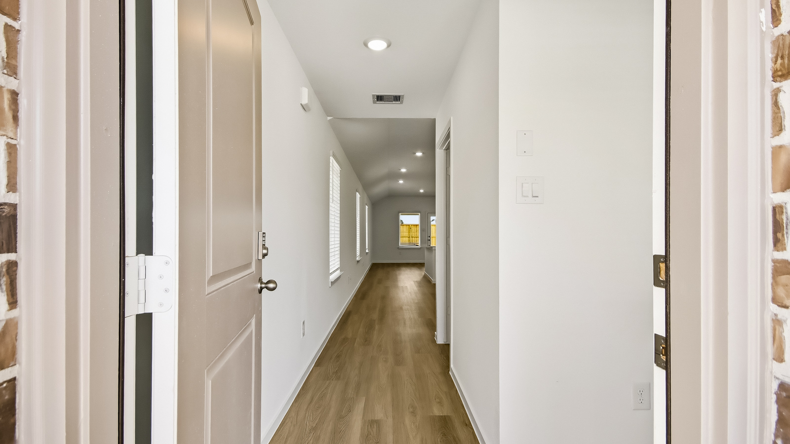 Entry hallway with vinyl flooring