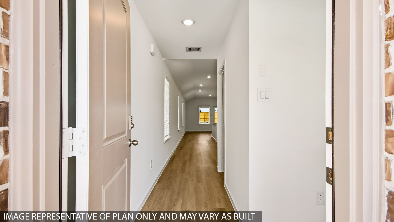 Entry hallway with vinyl flooring