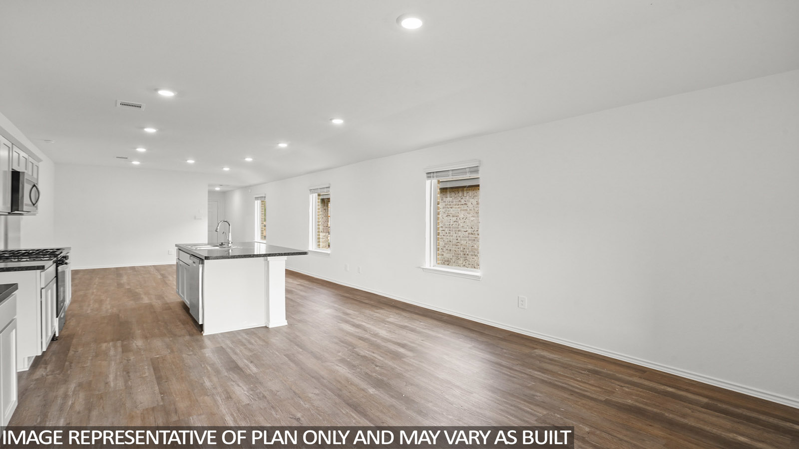 Open concept living, dining, and kitchen area