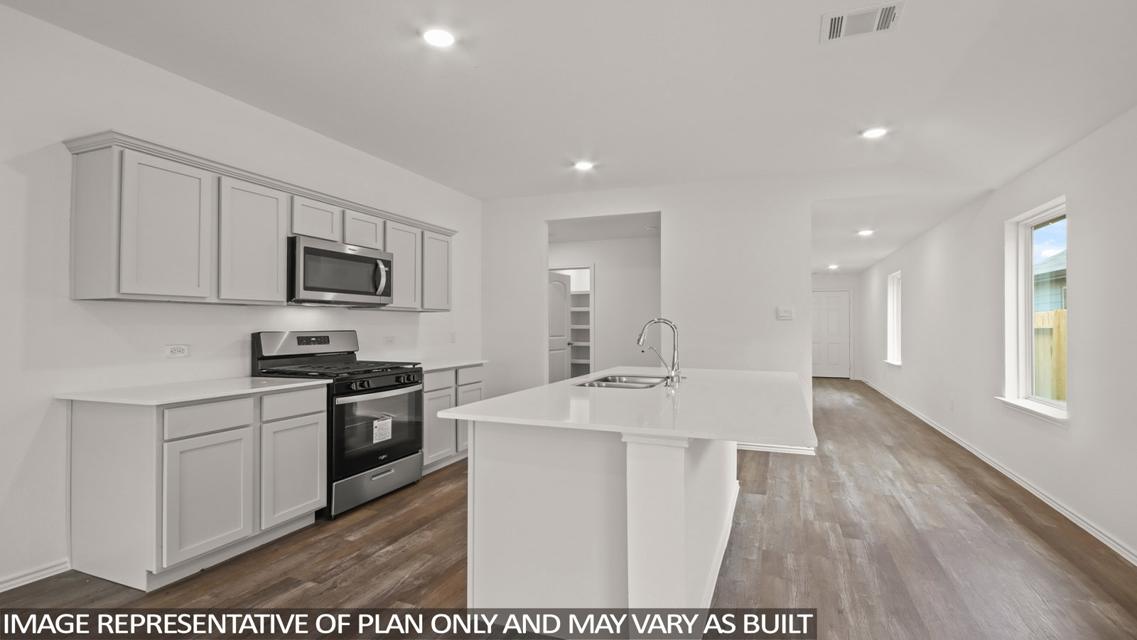 Open concept living, dining, and kitchen area