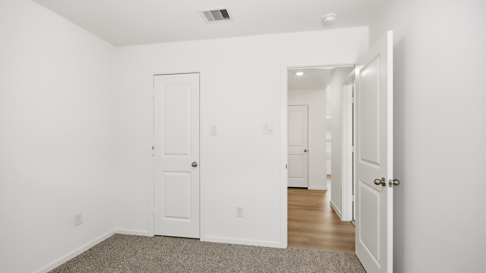 Secondary bedroom with bright window