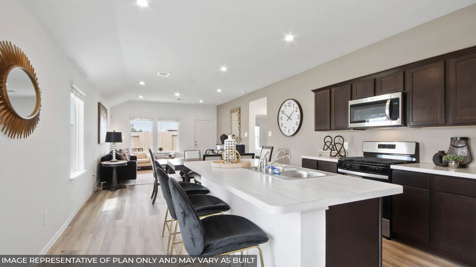 Open concept living, dining, and kitchen area