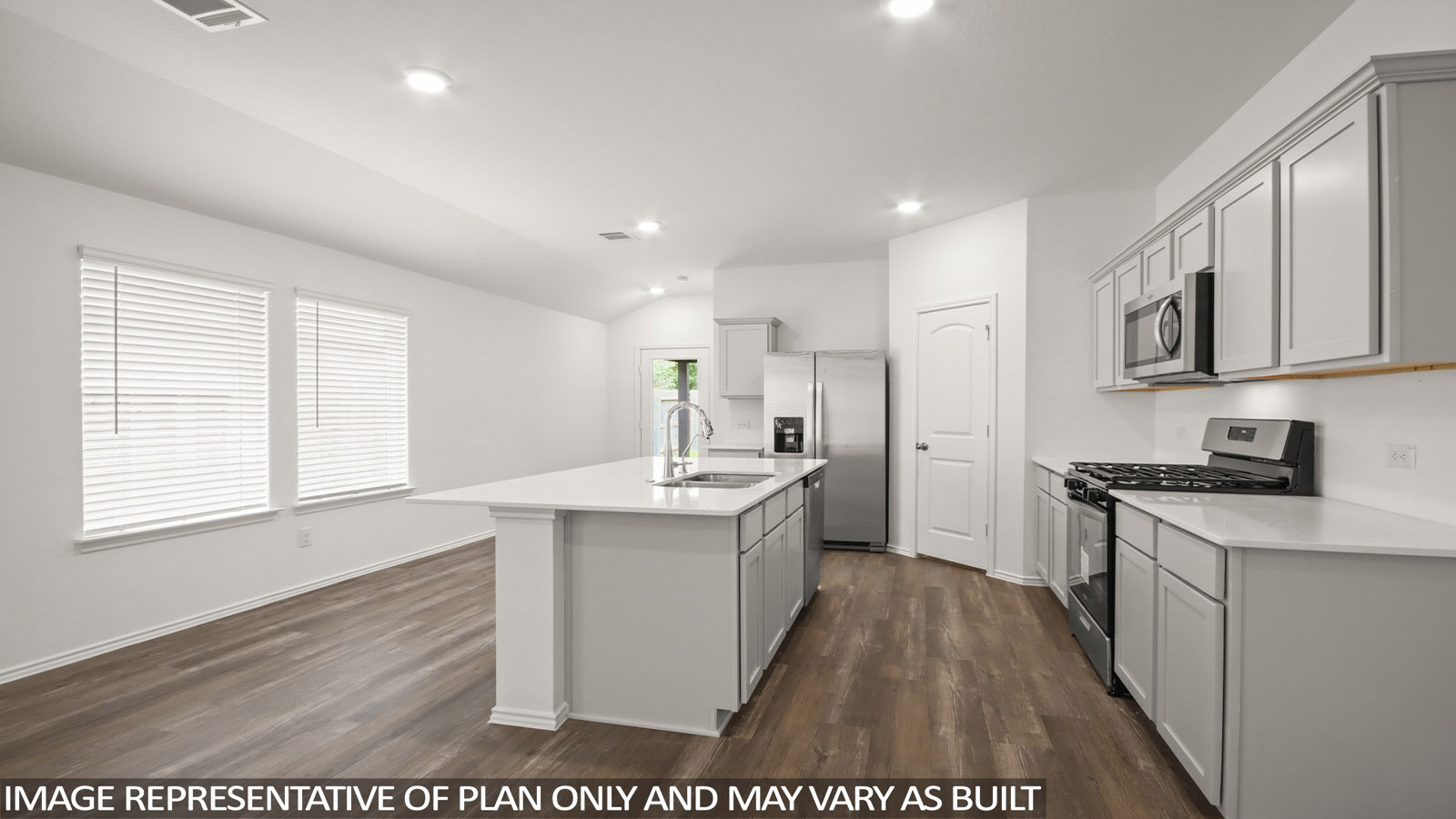 Open concept living, dining, and kitchen area