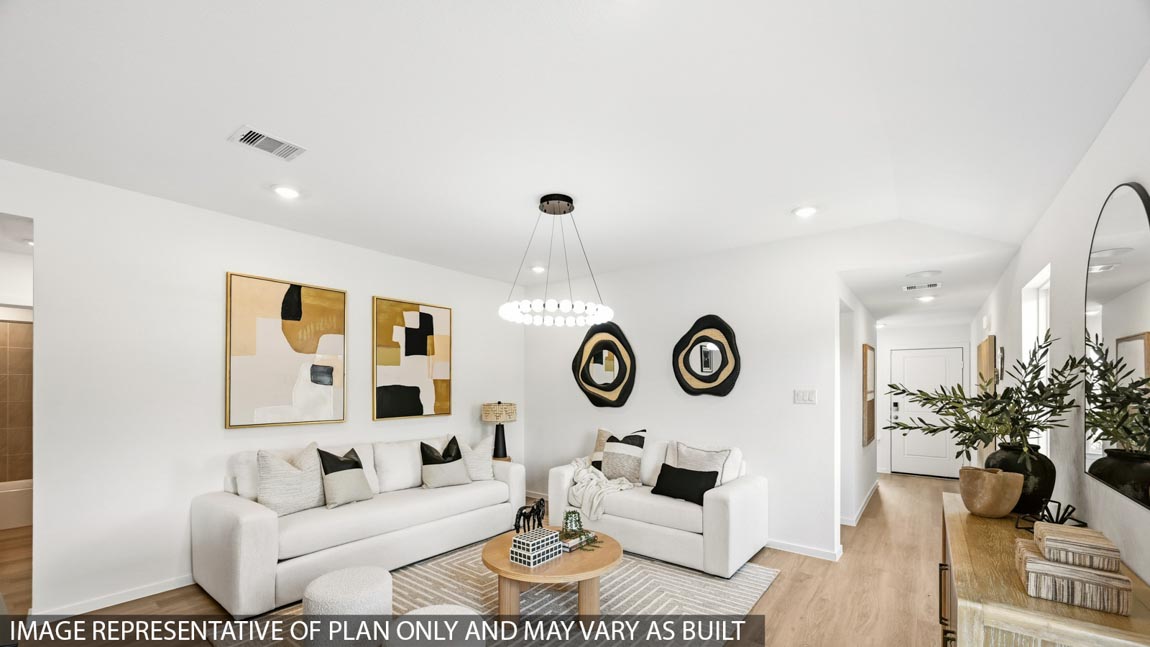 Open concept living, dining, and kitchen area