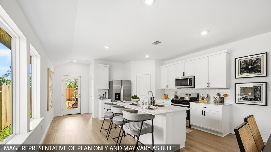 Open concept living, dining, and kitchen area
