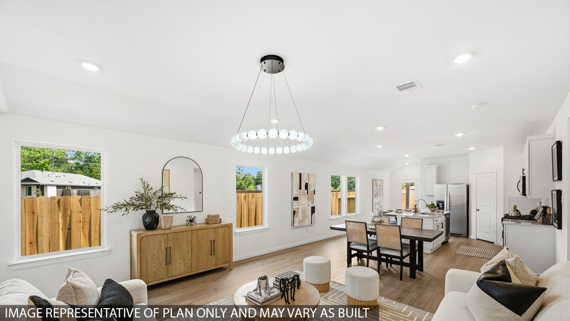 Open concept living, dining, and kitchen area