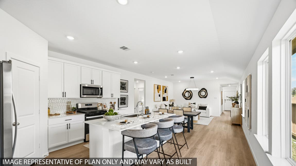Open concept living, dining, and kitchen area