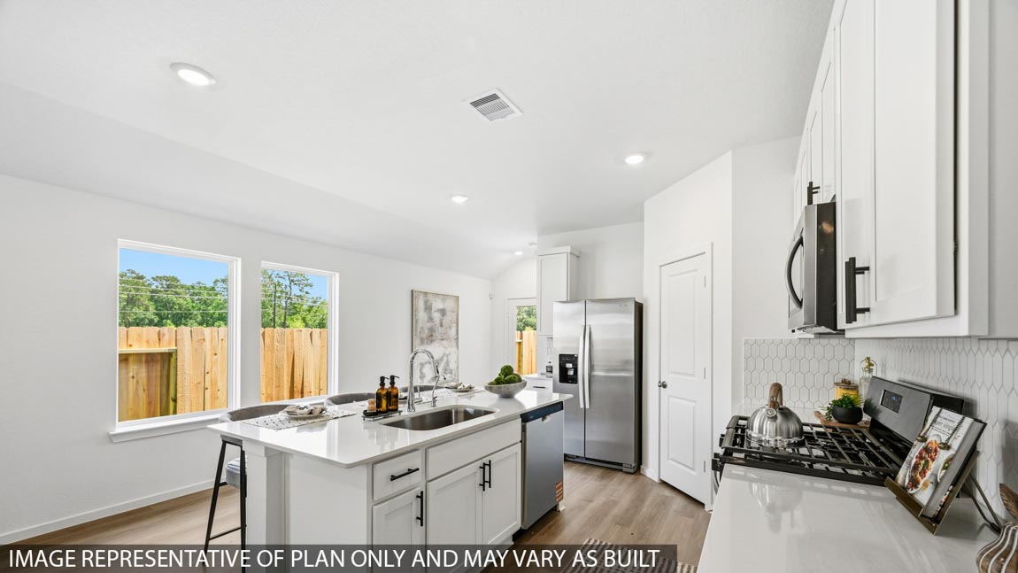 Open concept living, dining, and kitchen area