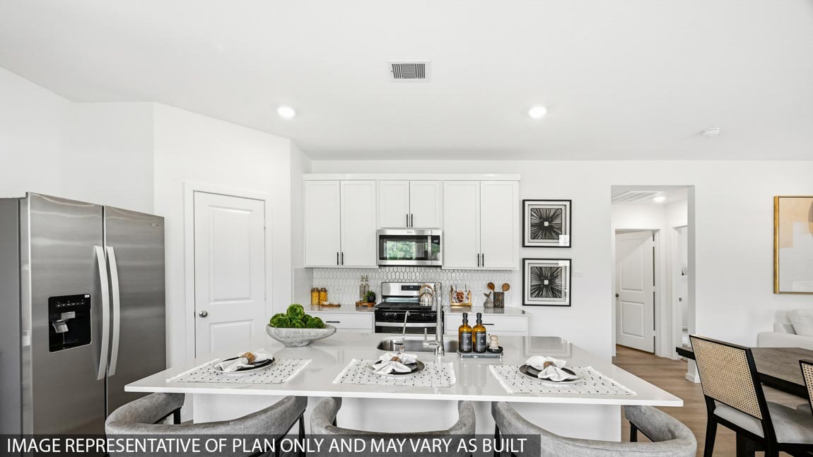 Open concept living, dining, and kitchen area