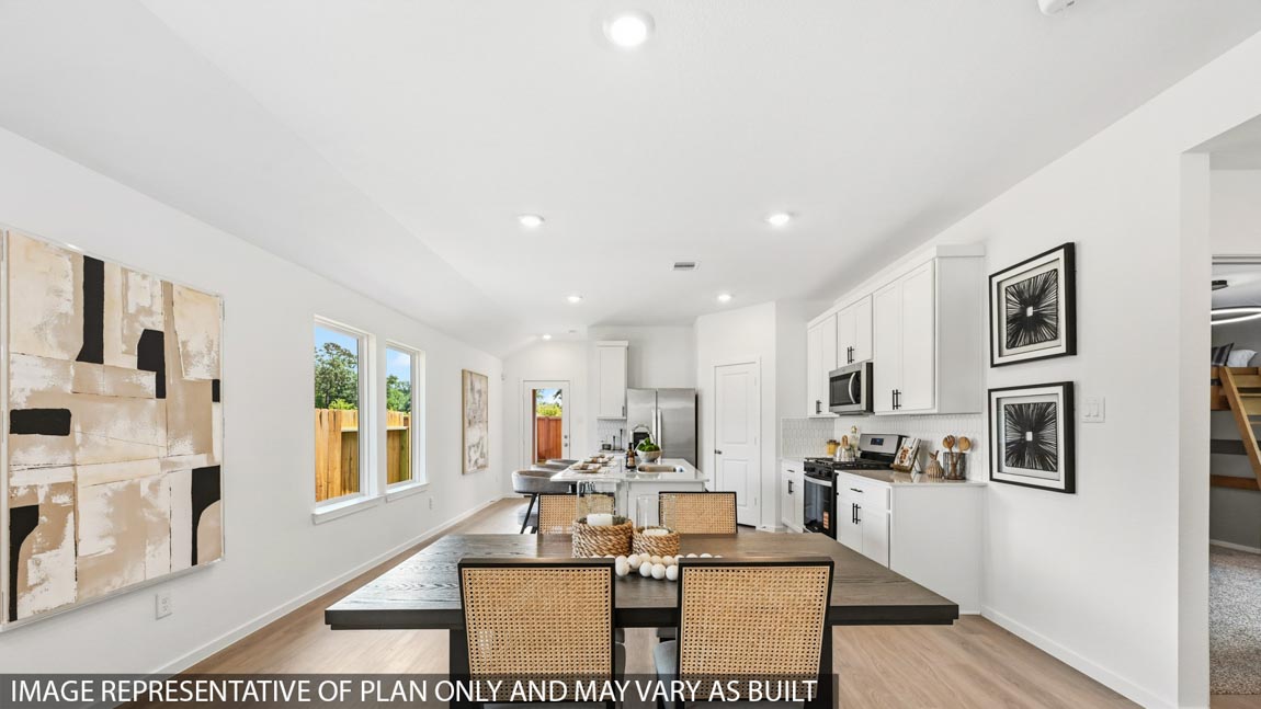 Open concept living, dining, and kitchen area