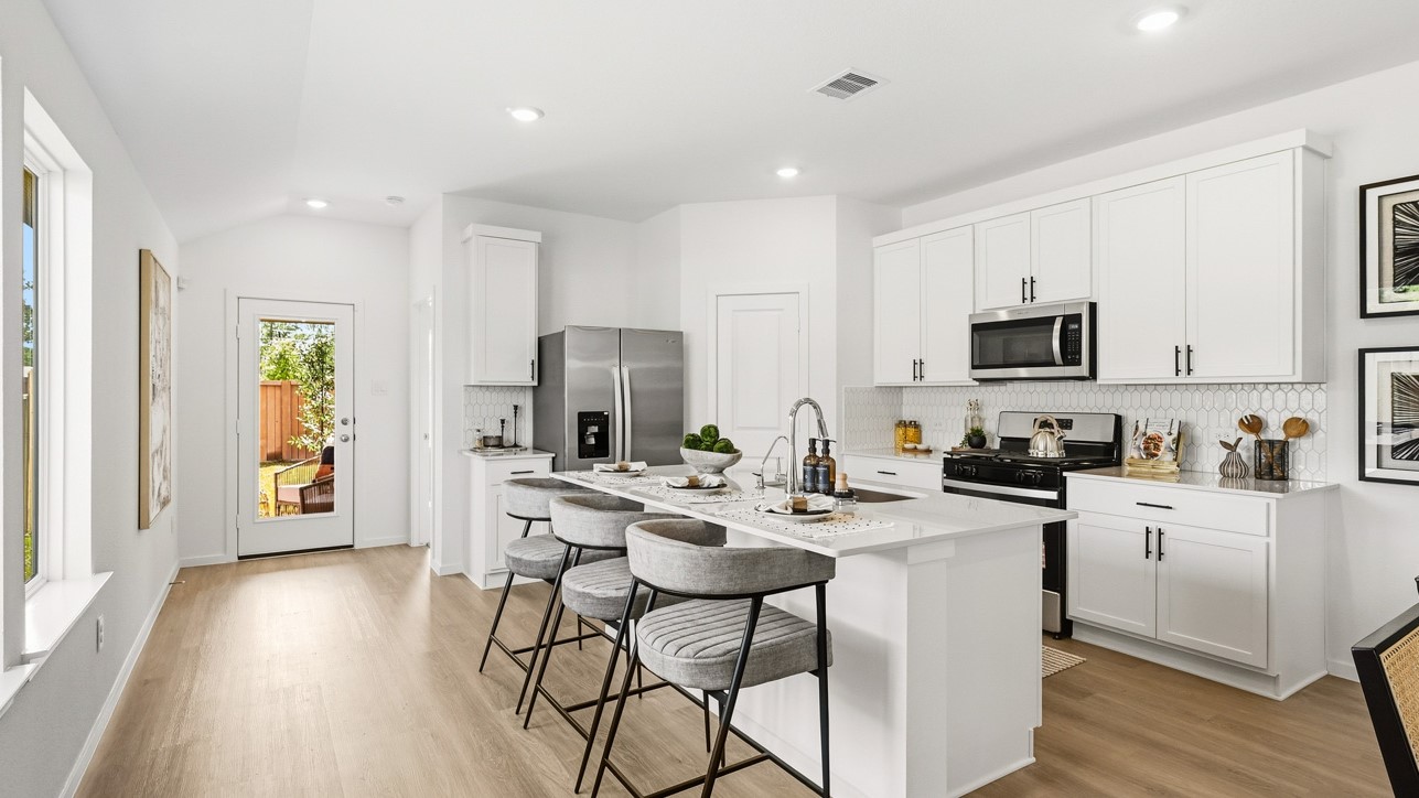 Open concept living, dining, and kitchen area