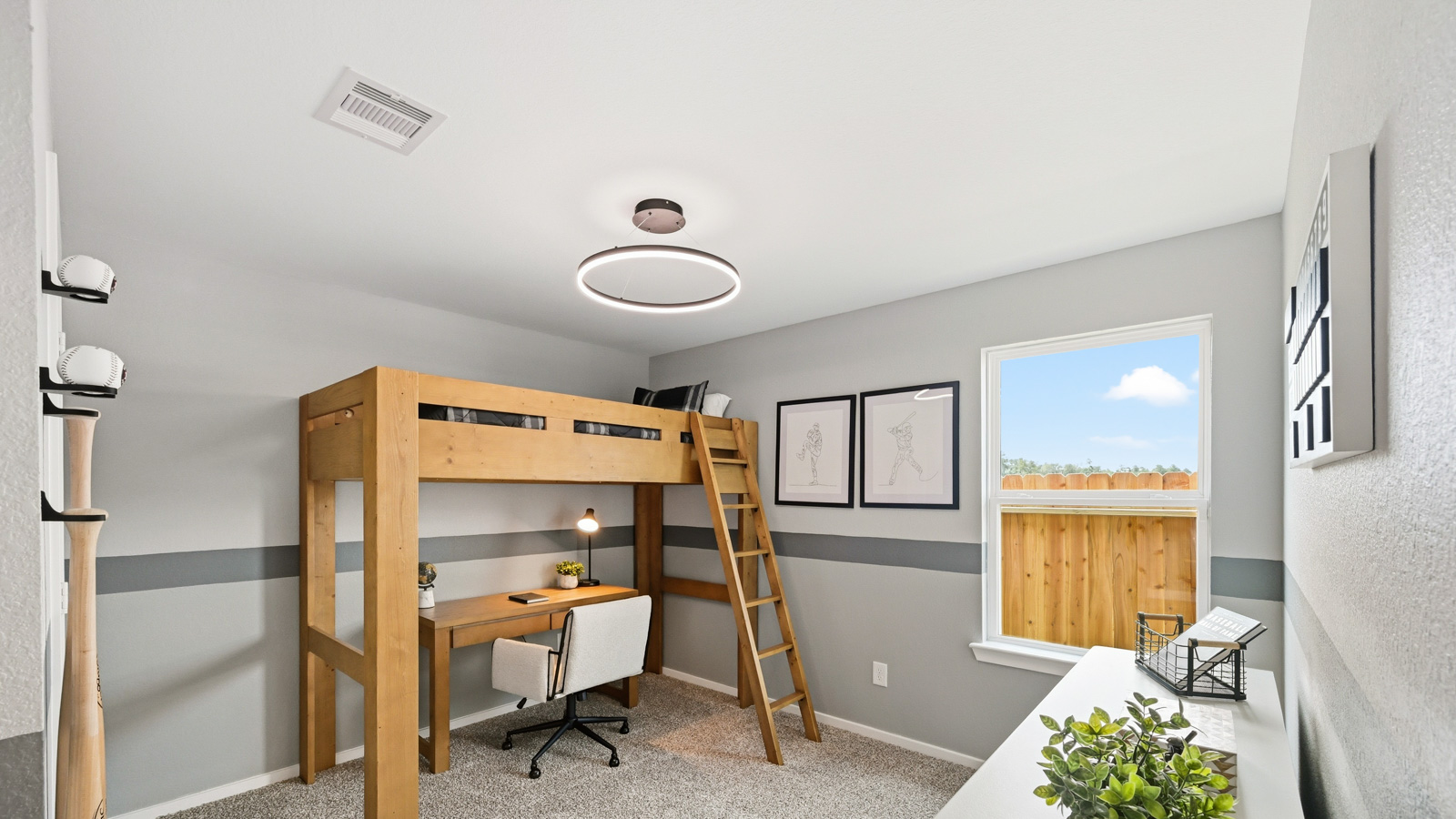 Secondary bedroom with carpet flooring
