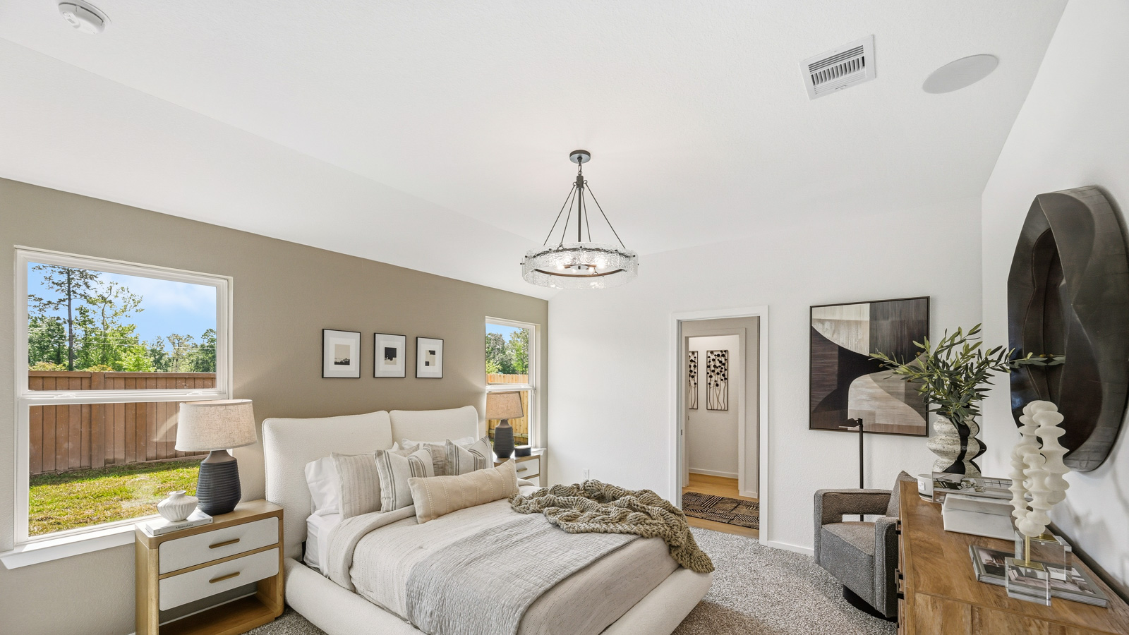 Primary bedroom with carpet flooring