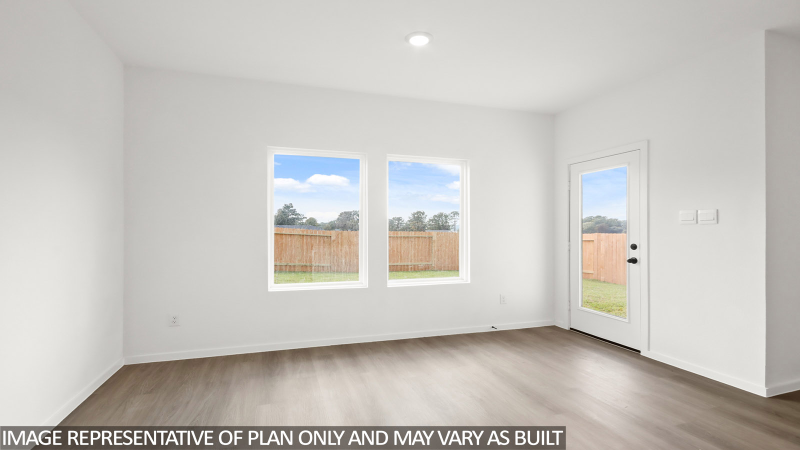 Open concept living, dining, and kitchen area