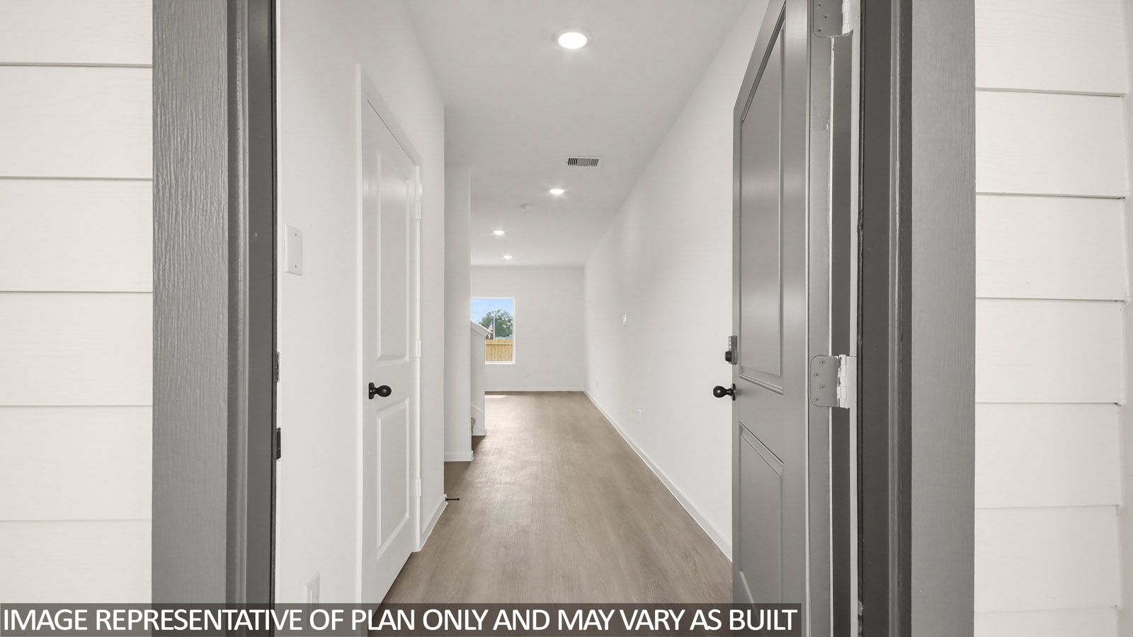 Entry hallway with vinyl flooring