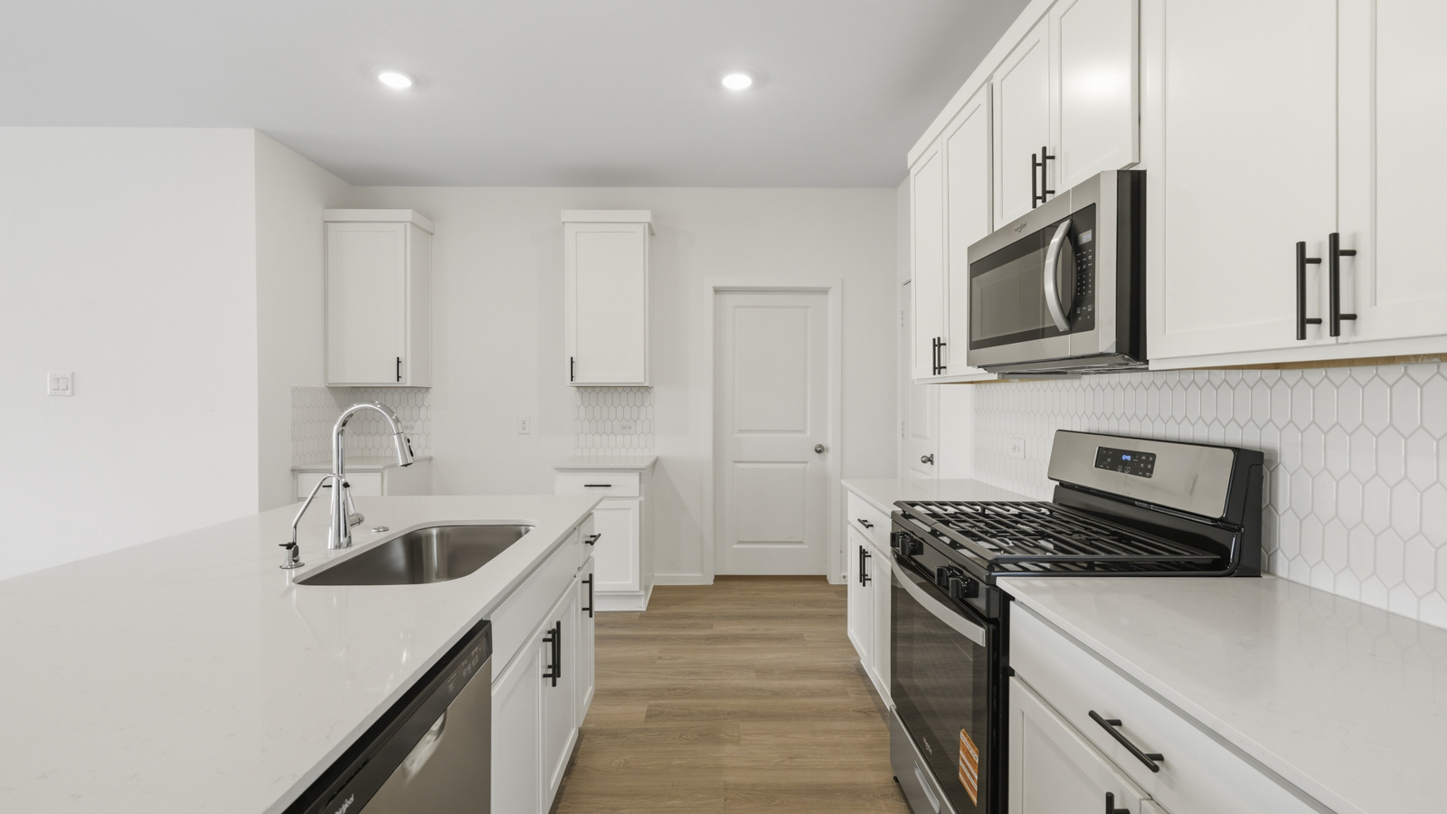 Open concept living, dining, and kitchen area