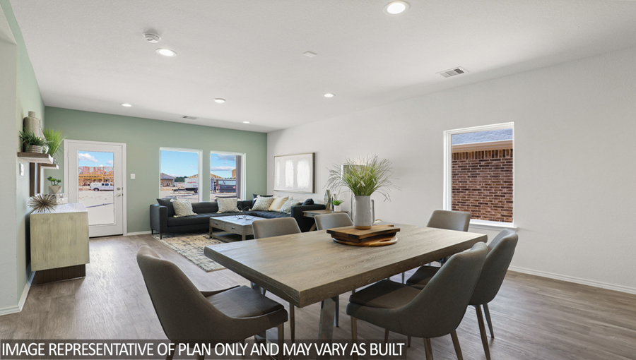 Open concept living, dining, and kitchen area