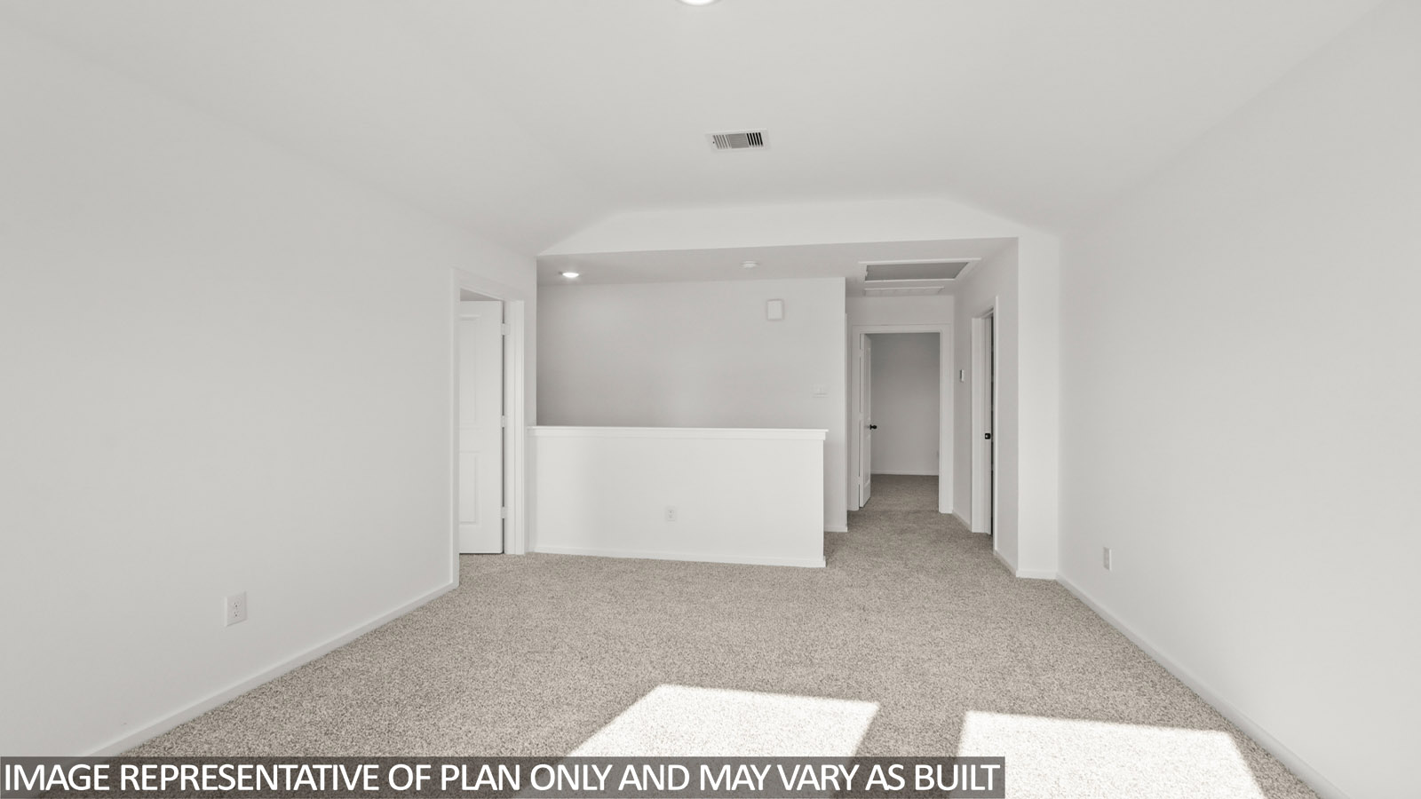 Second story game room with carpet flooring