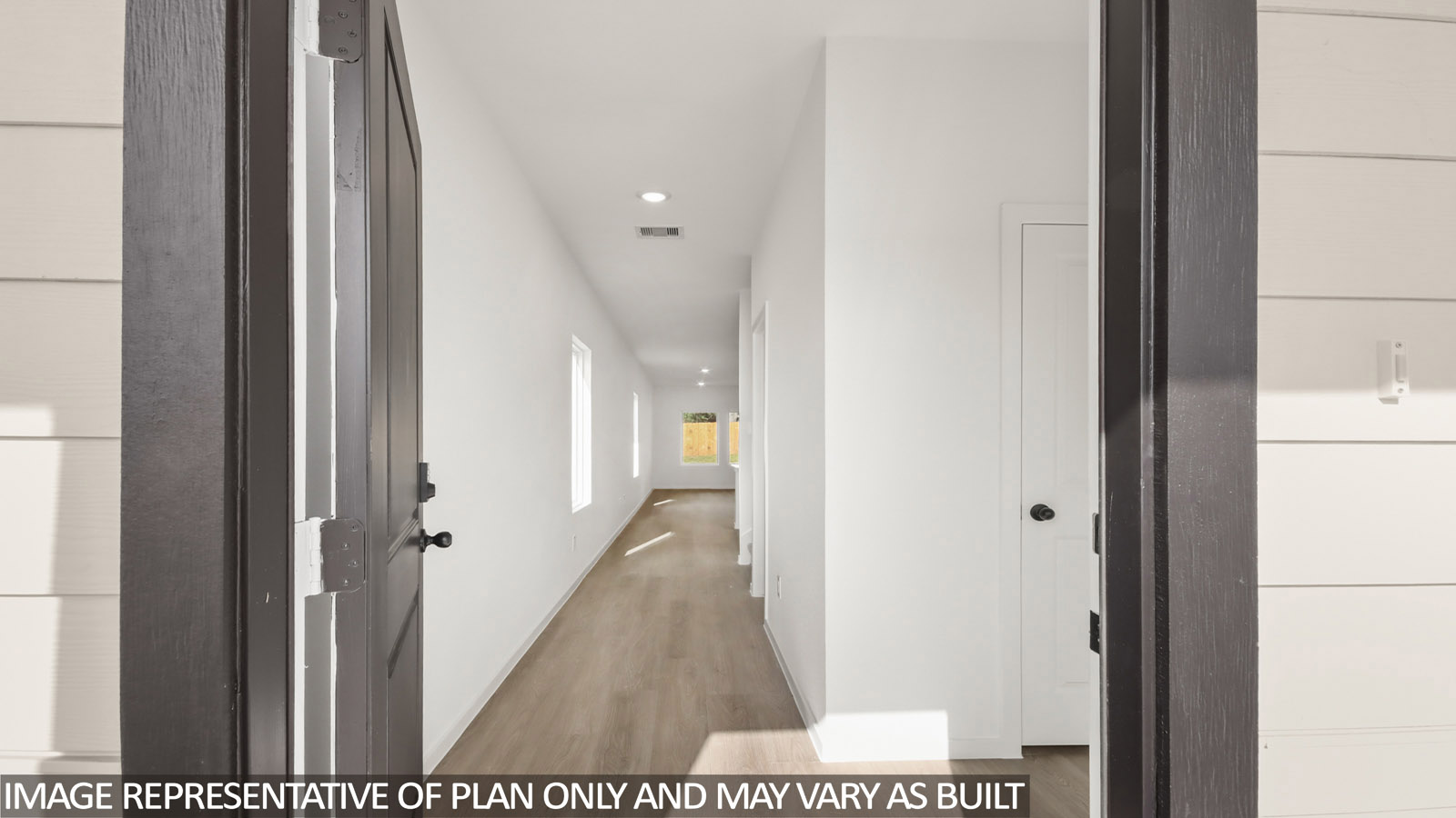 Entry hallway with vinyl flooring