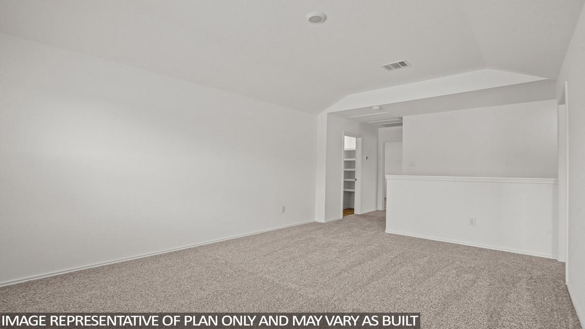 Second story game room with carpet flooring