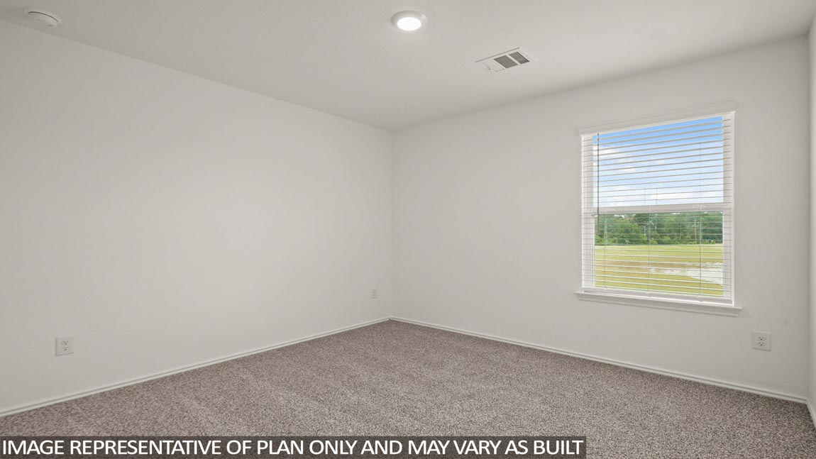 secondary bedroom with bright window
