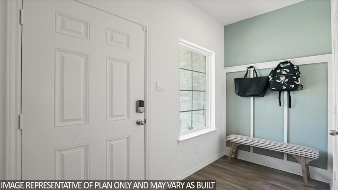 Entry hallway with vinyl flooring
