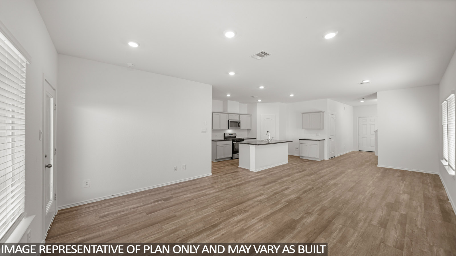 Open concept living, dining, and kitchen area