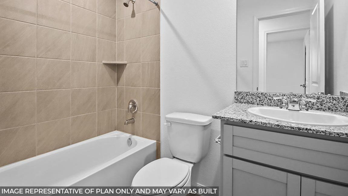 Secondary bathroom tub/shower combo.