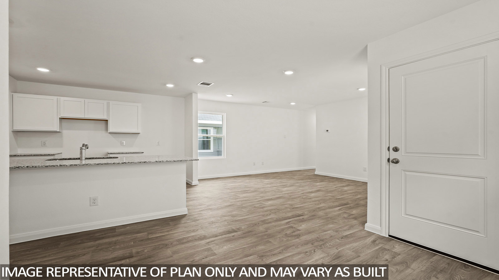 Open concept living, dining, and kitchen area