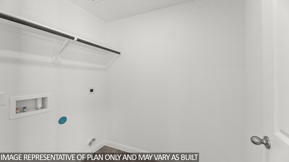 utility room with vinyl flooring