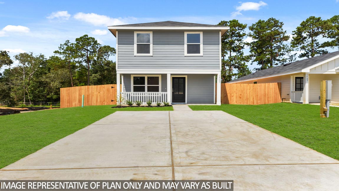 Two-story home with a two-car garage.