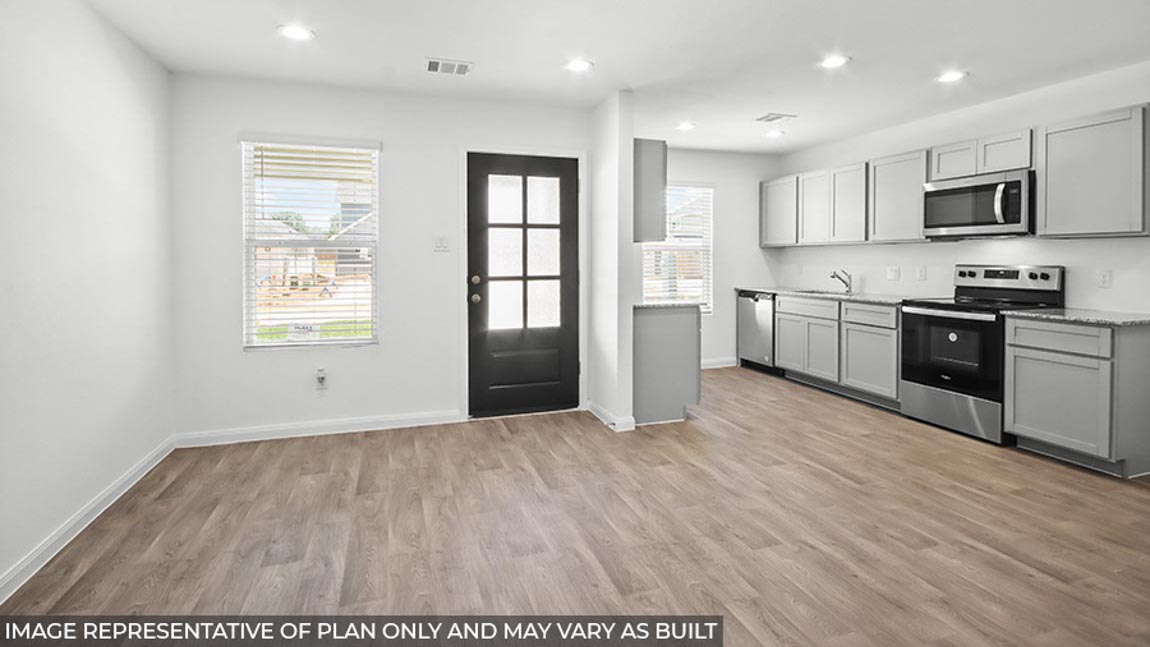 Open-concept living and dining space.