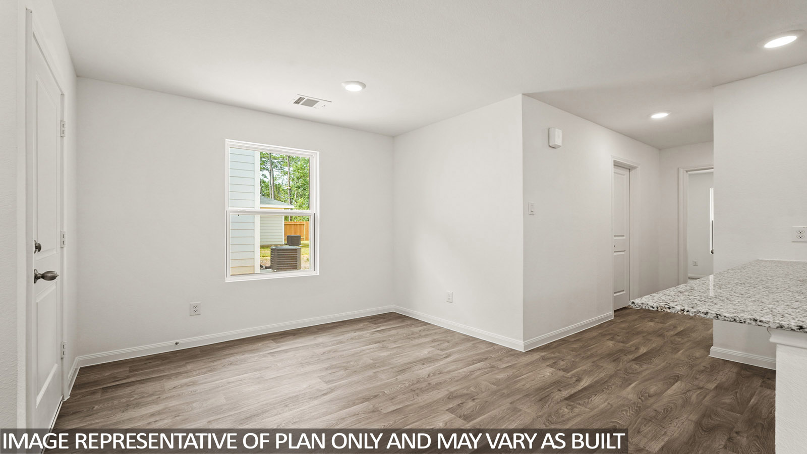 Open concept living, dining, and kitchen area