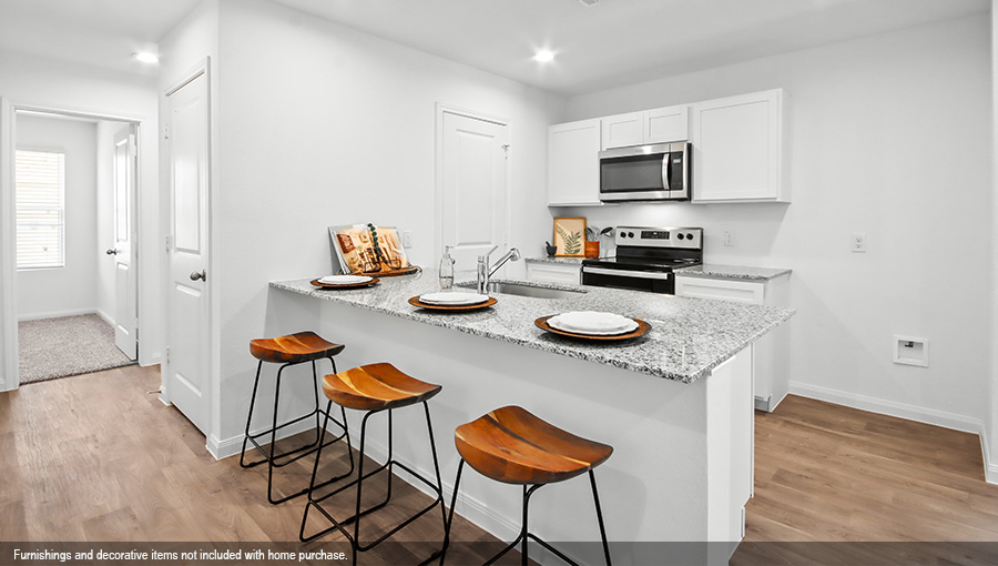 Open concept living, dining, and kitchen area