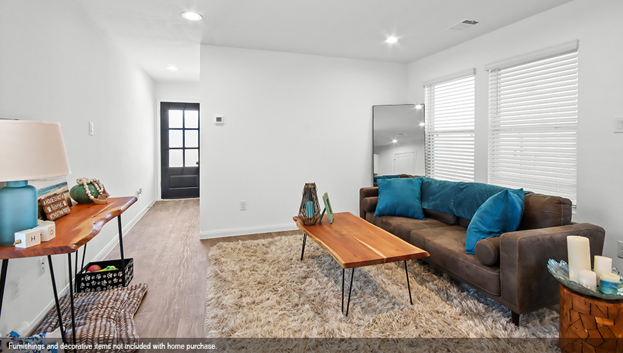 Open concept living, dining, and kitchen area