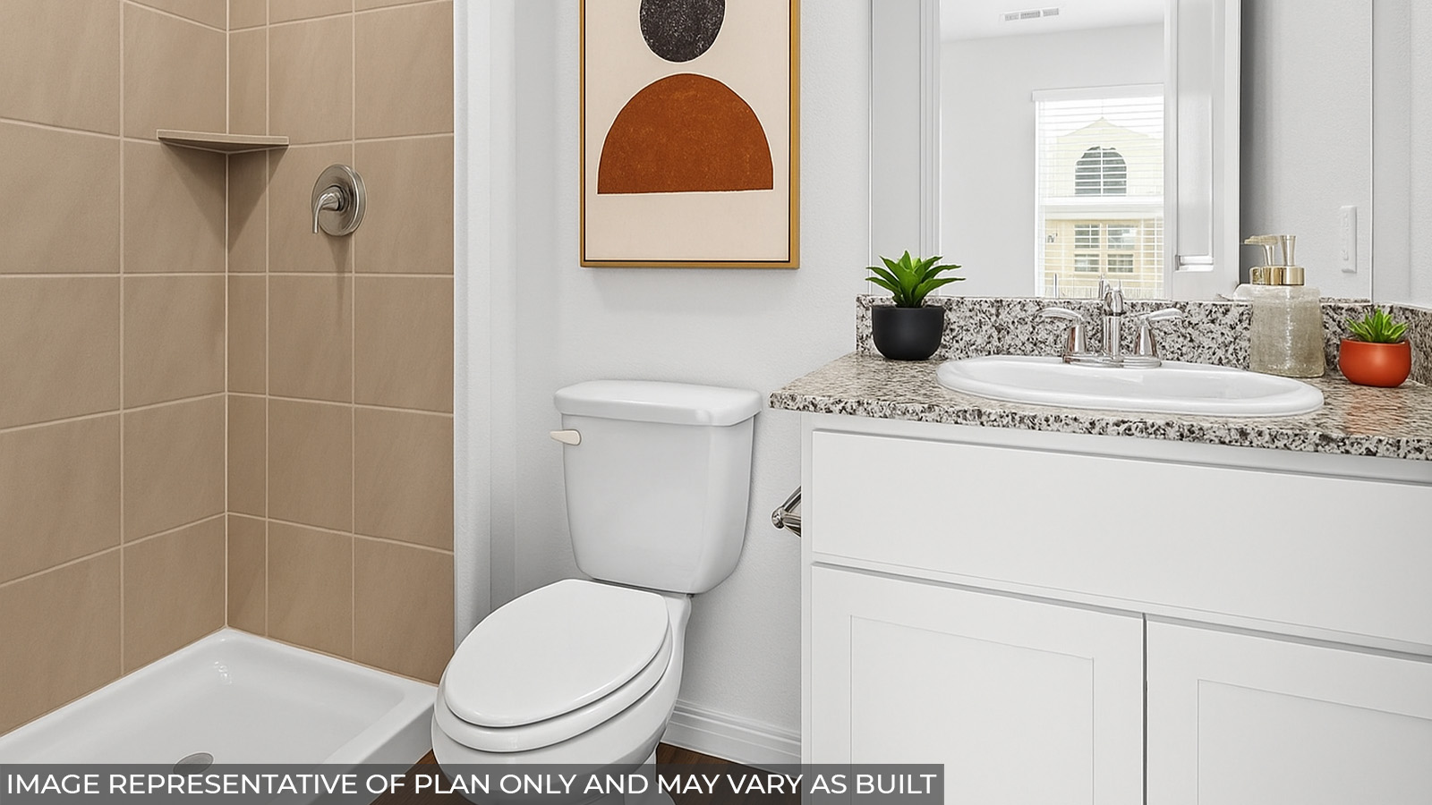 Staged primary bathroom with a tile standing shower.