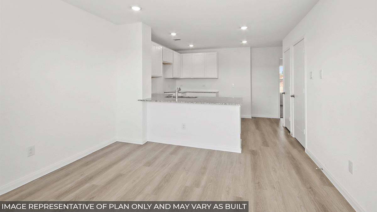 Open concept living, dining, and kitchen area