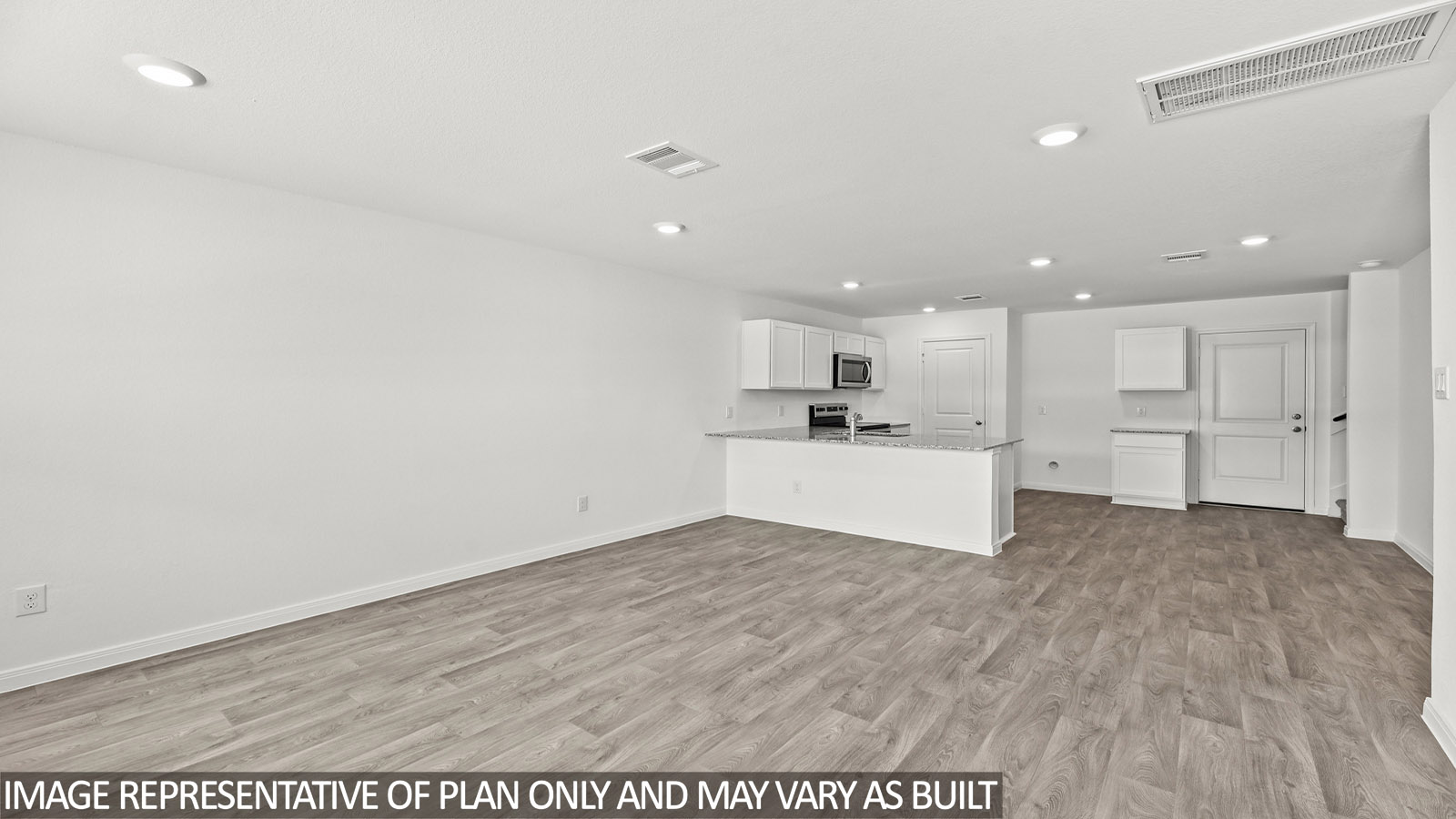 Open concept living, dining, and kitchen area