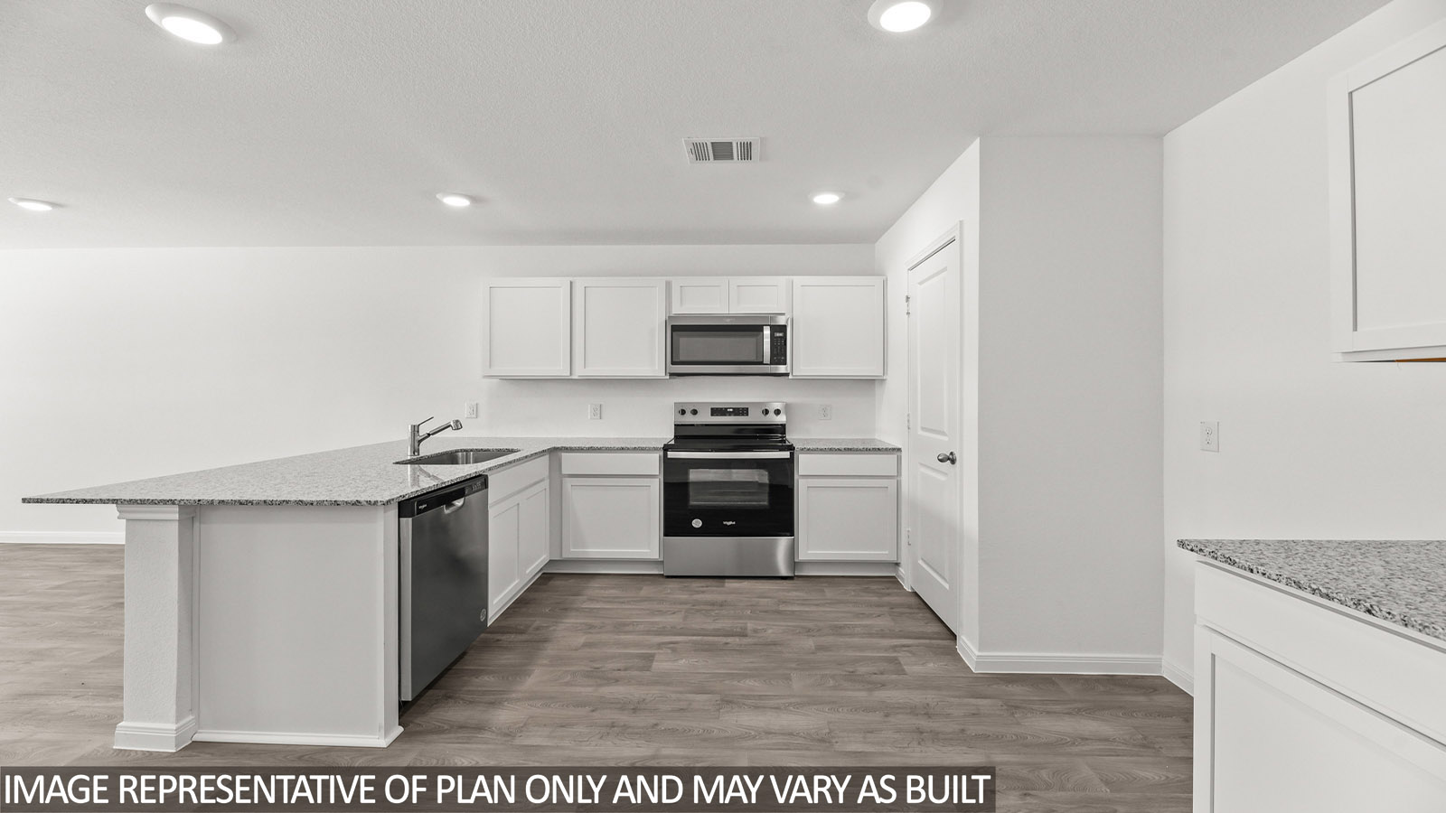 Open concept living, dining, and kitchen area
