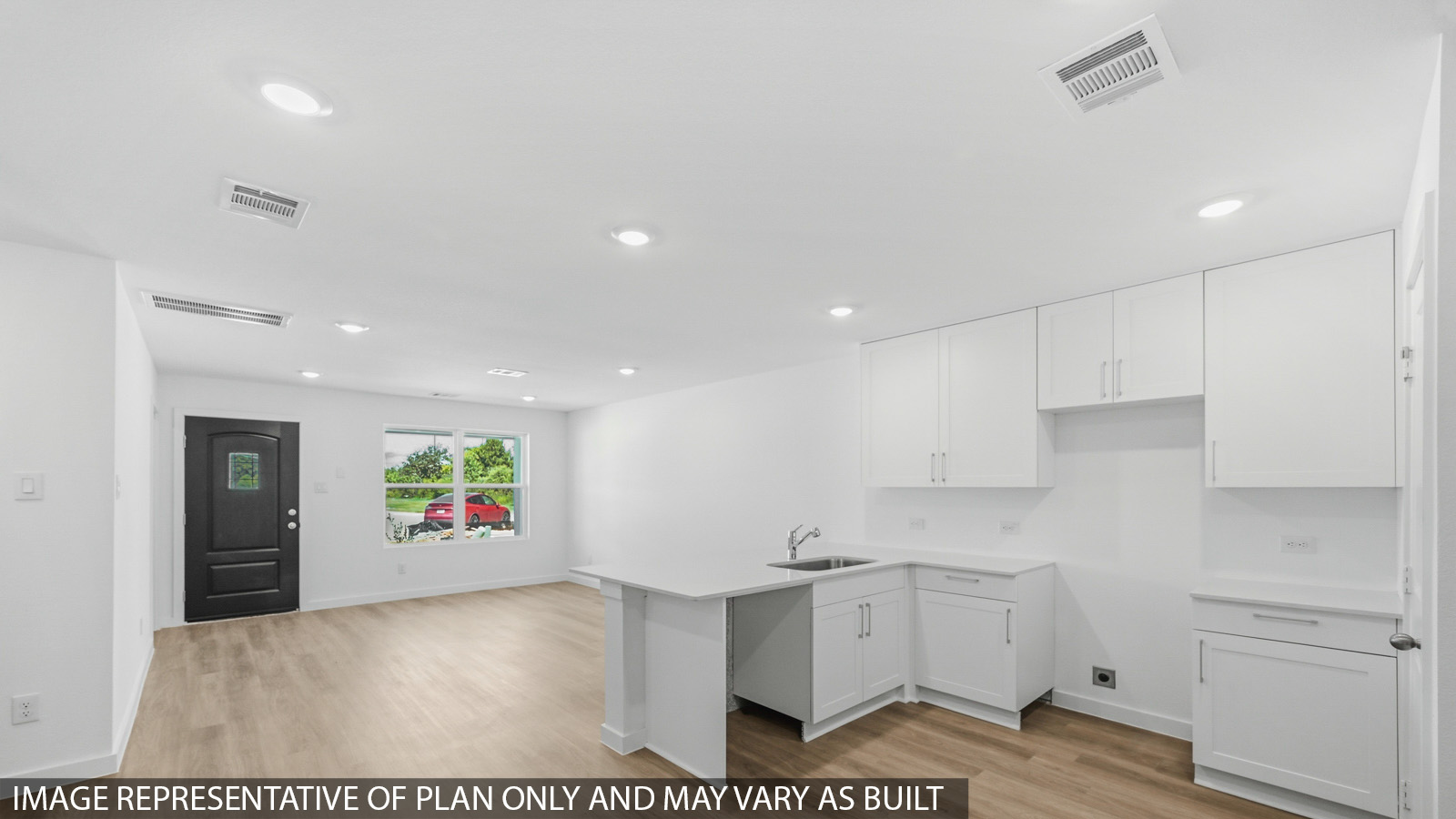 Open concept living, dining, and kitchen area