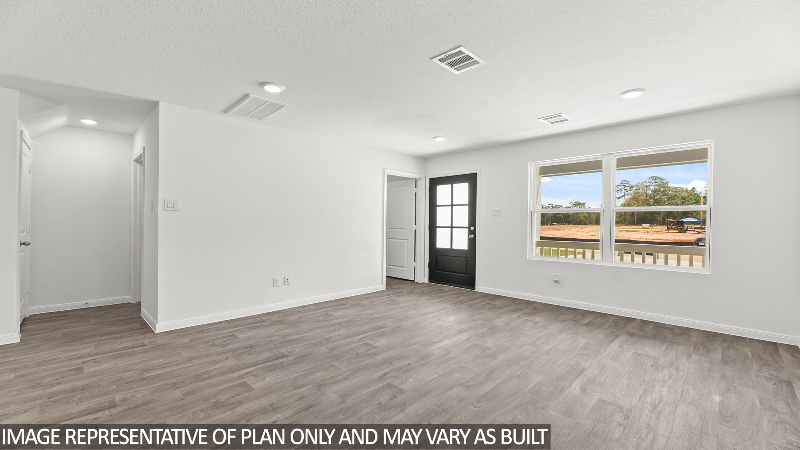 Open concept living, dining, and kitchen area