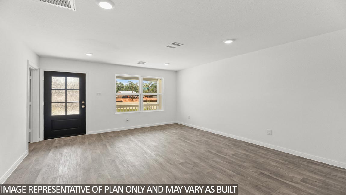 Open concept living, dining, and kitchen area