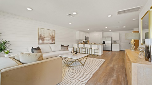 Open concept living, dining, and kitchen area